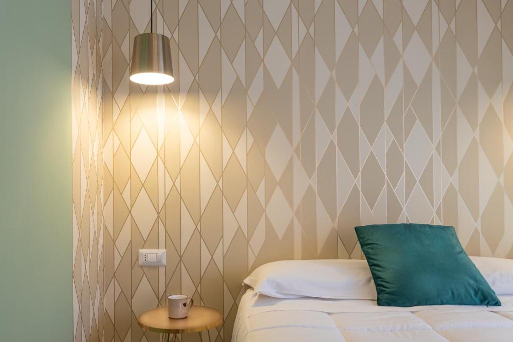 Postel nebo postele na pokoji v ubytování New Morpheus Rooms