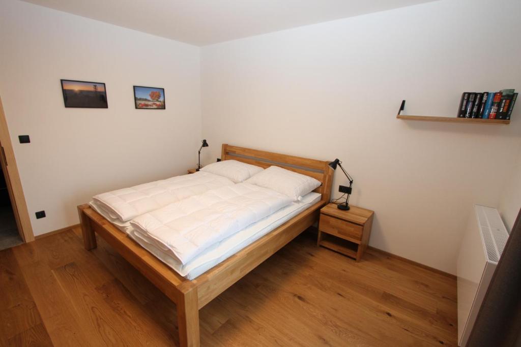 Postel nebo postele na pokoji v ubytování Helly - Kvilda - apartmány