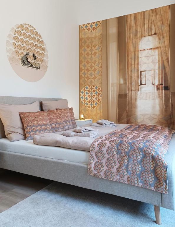 Posteľ alebo postele v izbe v ubytovaní Brody Art Boutique Apartments