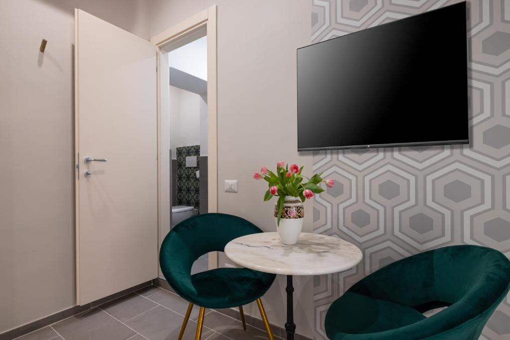TV a/nebo společenská místnost v ubytování New Morpheus Rooms