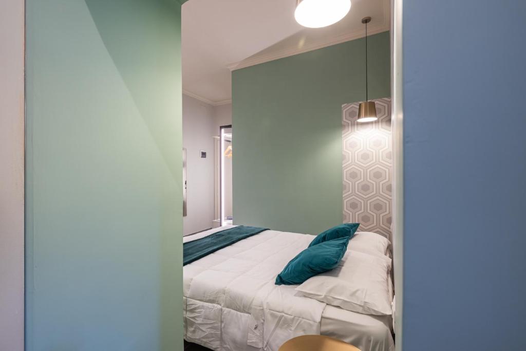 Postel nebo postele na pokoji v ubytování New Morpheus Rooms