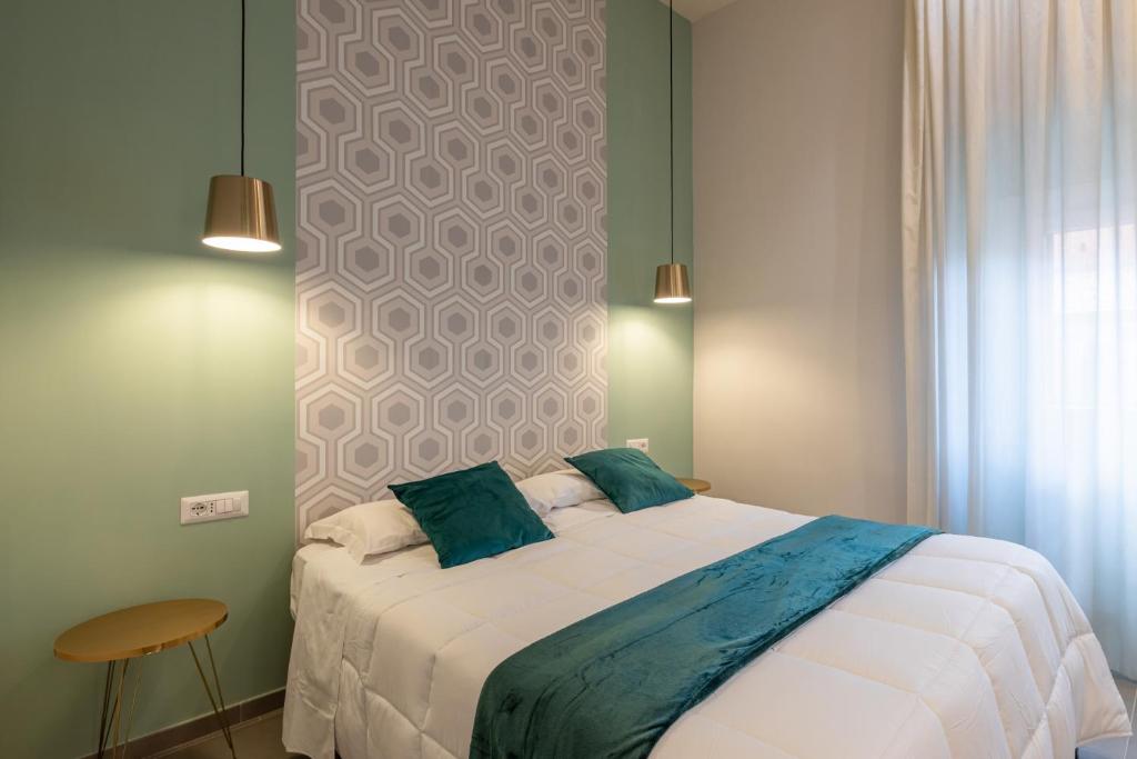 Postel nebo postele na pokoji v ubytování New Morpheus Rooms