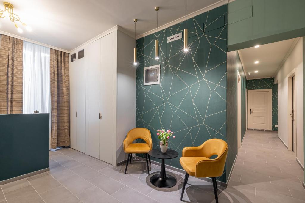 Posezení v ubytování New Morpheus Rooms