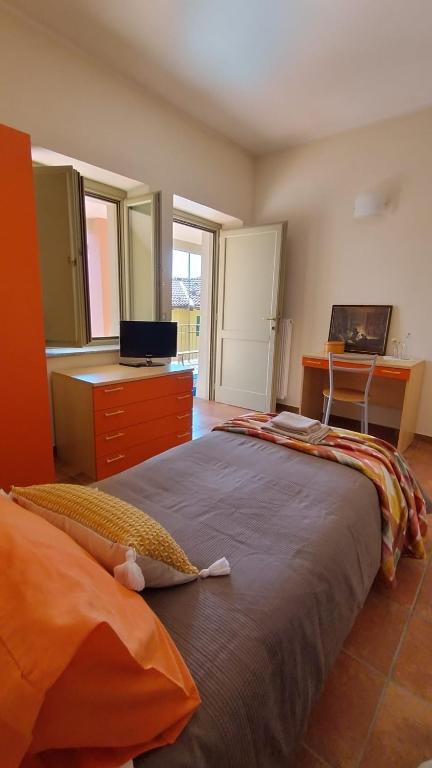 Łóżko lub łóżka w pokoju w obiekcie La Locanda di Campagna a Guardabosone