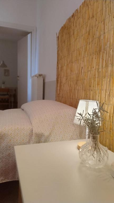Łóżko lub łóżka w pokoju w obiekcie La Locanda di Campagna a Guardabosone