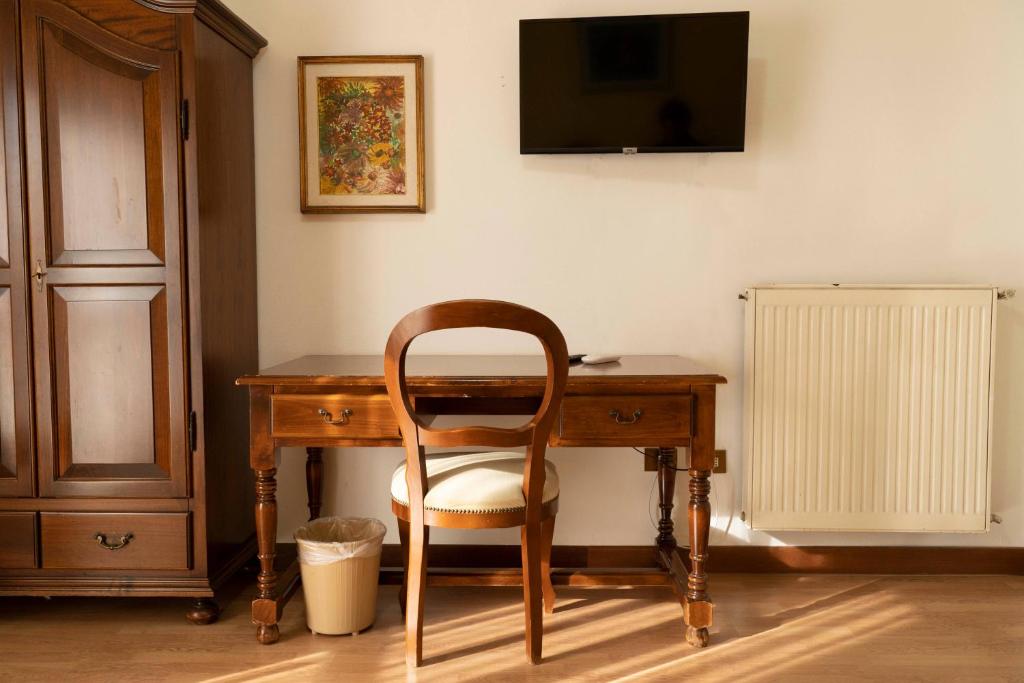 TV a/nebo společenská místnost v ubytování Albergo San Lorenzo