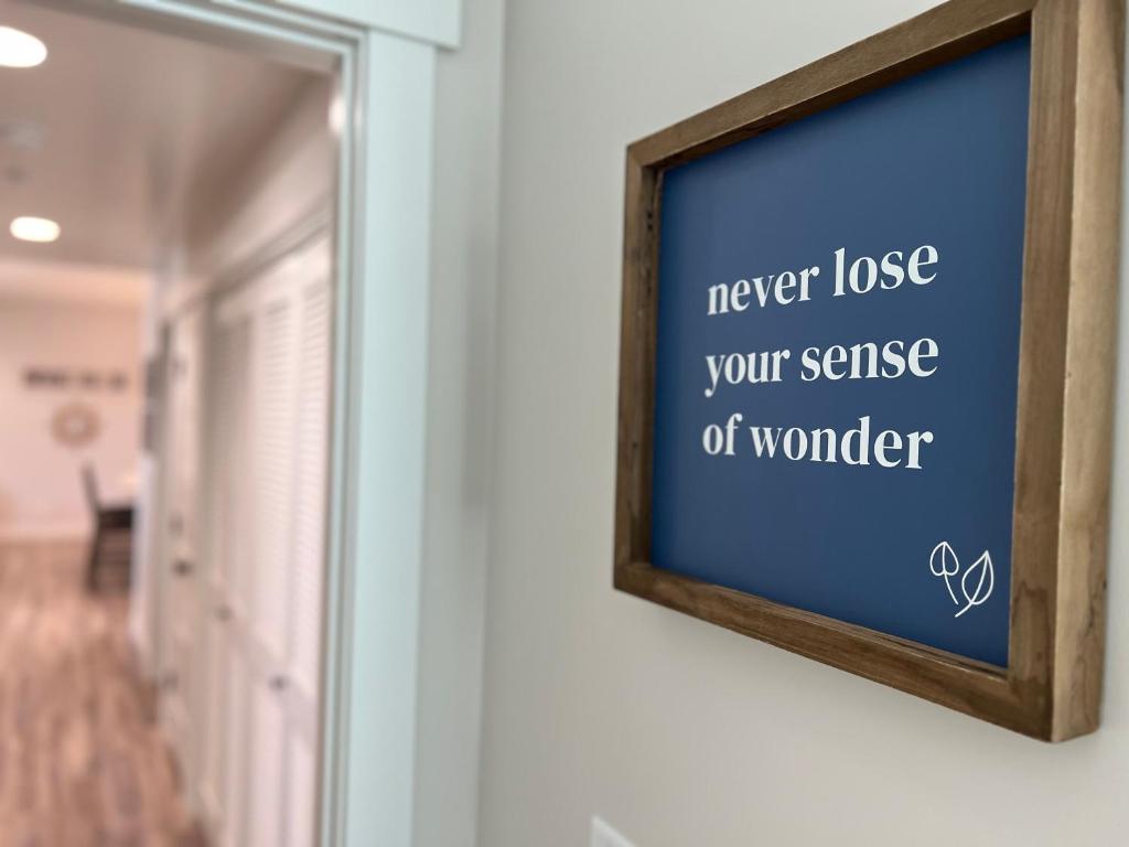 a mirror with the words never lose your sense of wonder at Fish Lake Suite - Castle Rock Condos in Richfield
