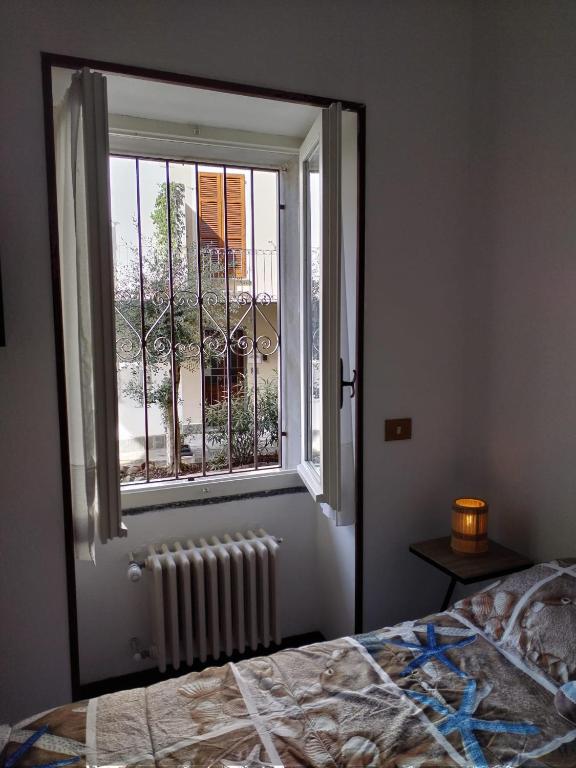 Postel nebo postele na pokoji v ubytování LATTE E MIELE