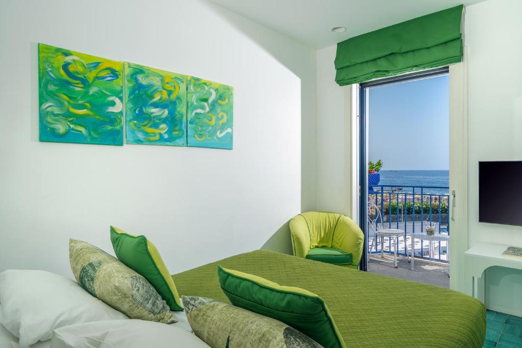 TV a/nebo společenská místnost v ubytování Le Ancore Hotel