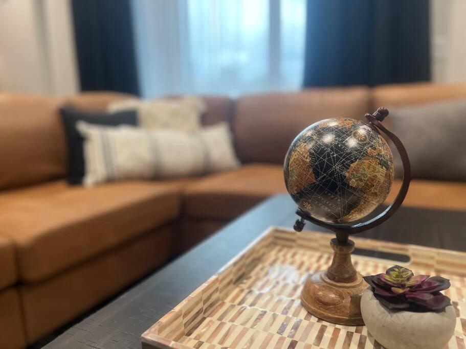 a globe sitting on a table in a living room at Sunset Suite - Castle Rock Condos in Richfield