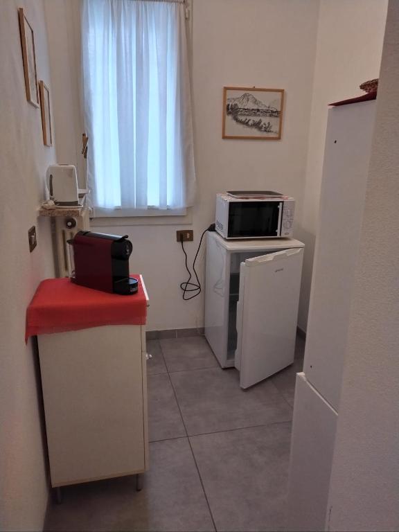 Kuchyň nebo kuchyňský kout v ubytování LATTE E MIELE