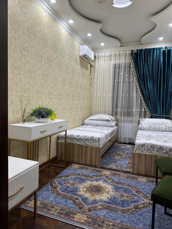 Postel nebo postele na pokoji v ubytování Sultan Saray