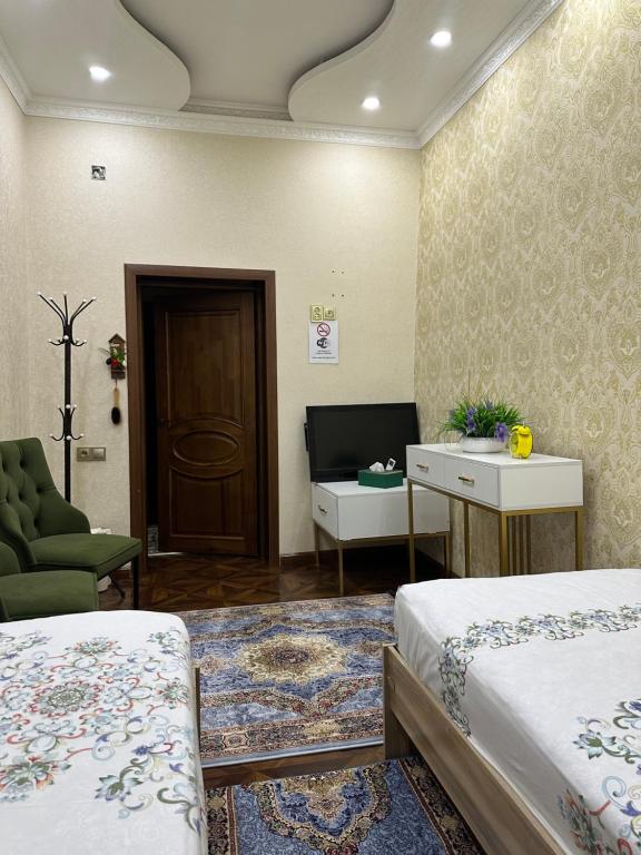 Postel nebo postele na pokoji v ubytování Sultan Saray