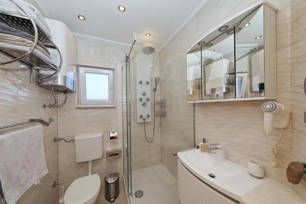 Kúpeľňa v ubytovaní Apartman Sipina 2