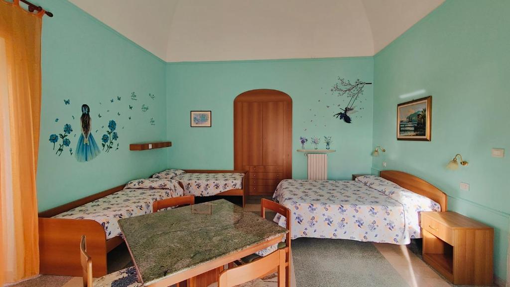 Postel nebo postele na pokoji v ubytování B&B Relax