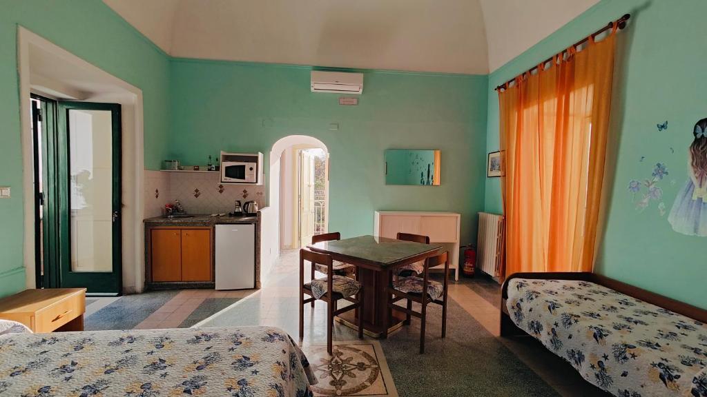 Kuchyň nebo kuchyňský kout v ubytování B&B Relax