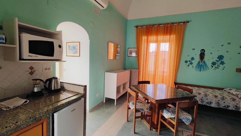 Kuchyň nebo kuchyňský kout v ubytování B&B Relax