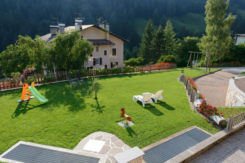 Vonkajšia záhrada v ubytovaní FORESTO holiday apartments