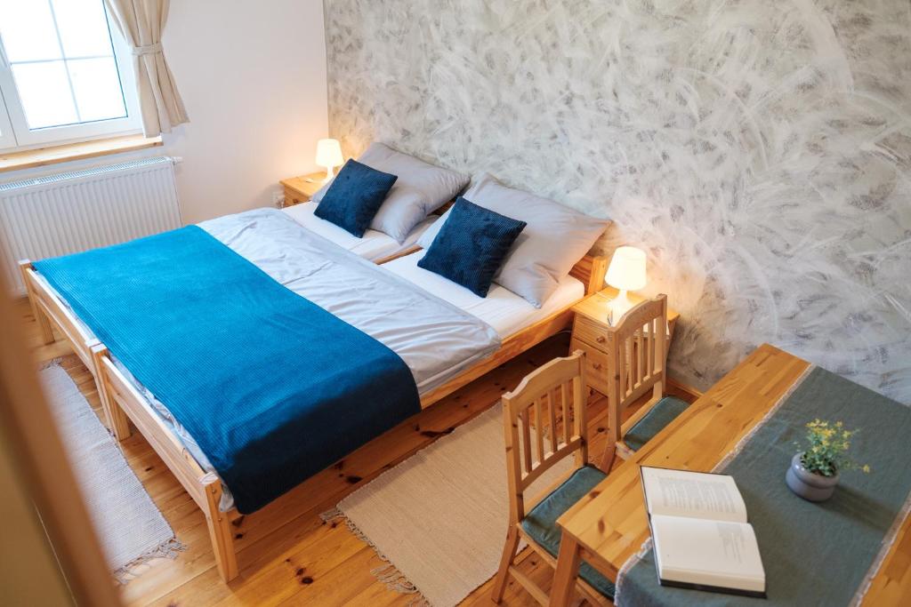 Postel nebo postele na pokoji v ubytování U staré cesty