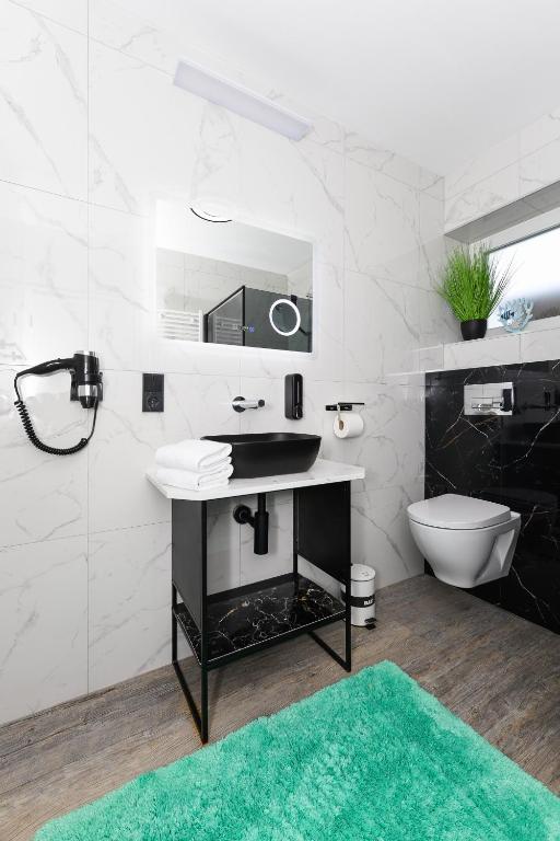 Fotografie z fotogalerie ubytování Haus Strandkorb mit Frühstücksoption v destinaci Bensersiel