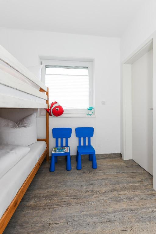 Postel nebo postele na pokoji v ubytování Haus Strandkorb mit Frühstücksoption