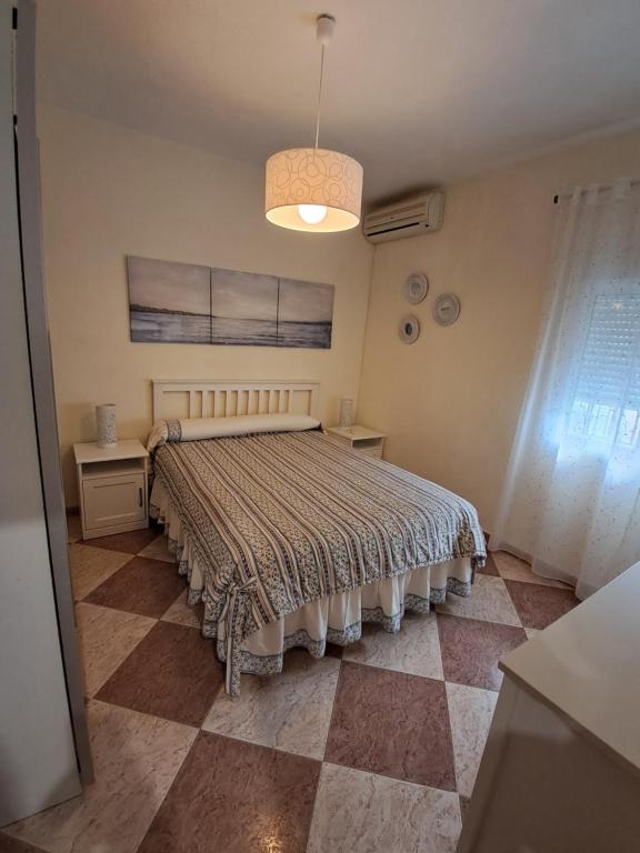 Posteľ alebo postele v izbe v ubytovaní Casa la Viña- ALQUILER FAMILIAS Y PAREJAS