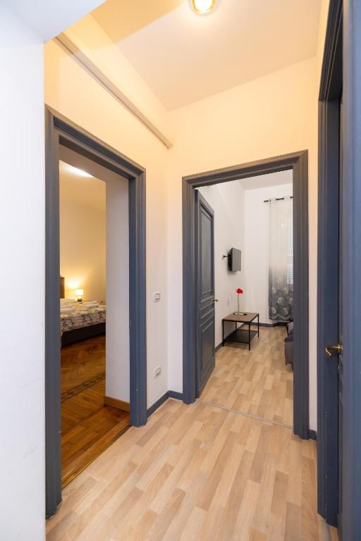 Łóżko lub łóżka w pokoju w obiekcie Adriana sweet apartment