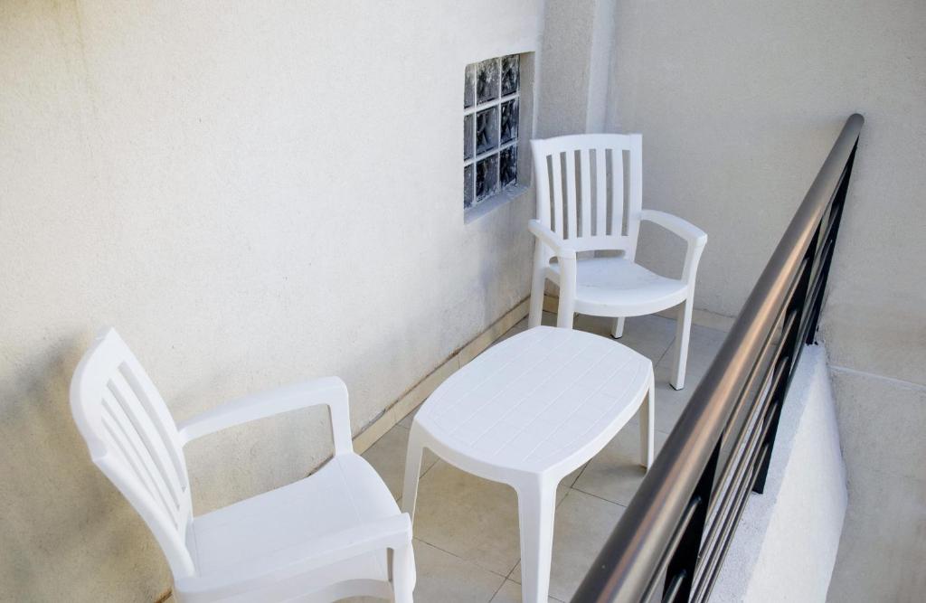 Posezení v ubytování Le Batiment Apartmentos