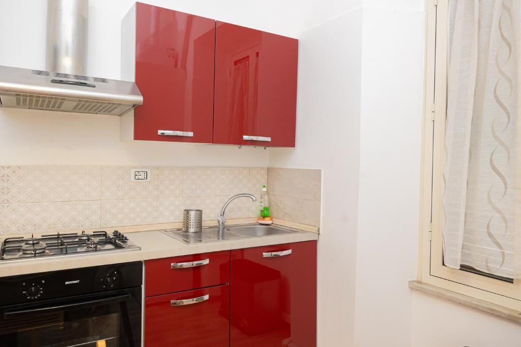 Kuchnia lub aneks kuchenny w obiekcie Adriana sweet apartment