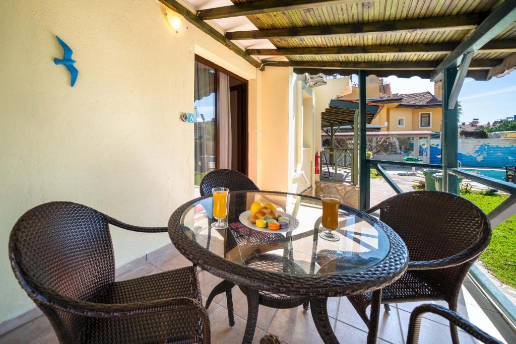 Balkón nebo terasa v ubytování Dedeminn Garden Hotel