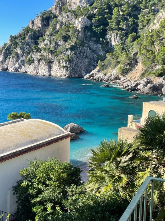 a view of the ocean from a house at La Cuchina in Capri
