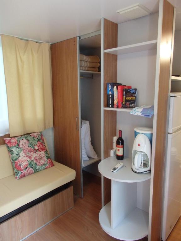 Postel nebo postele na pokoji v ubytování Camping Village la Chiocciola