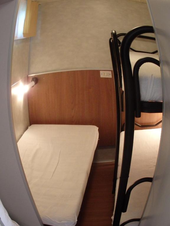 Postel nebo postele na pokoji v ubytování Camping Village la Chiocciola