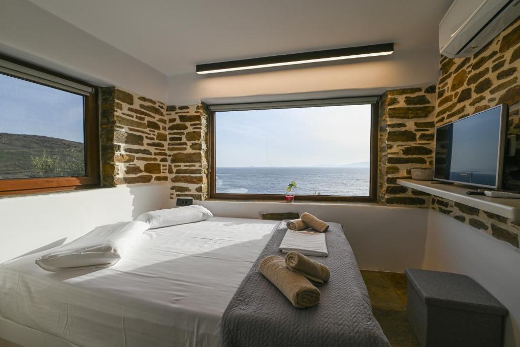 Postel nebo postele na pokoji v ubytování M&K kelè Zannel seaside serenity