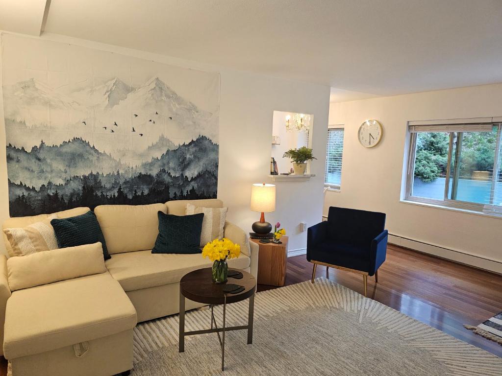 a living room with a couch and a table at Cozy 1BR Near Convention Center Downtown in Seattle