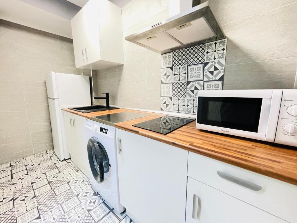 Kuchyň nebo kuchyňský kout v ubytování Elegance Plaza - Salou Suites