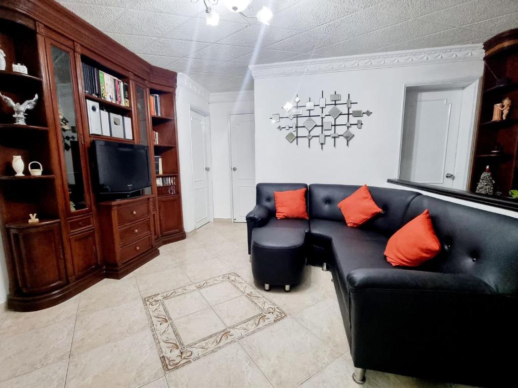 TV a/nebo společenská místnost v ubytování Hermosa casa en Bucaramanga