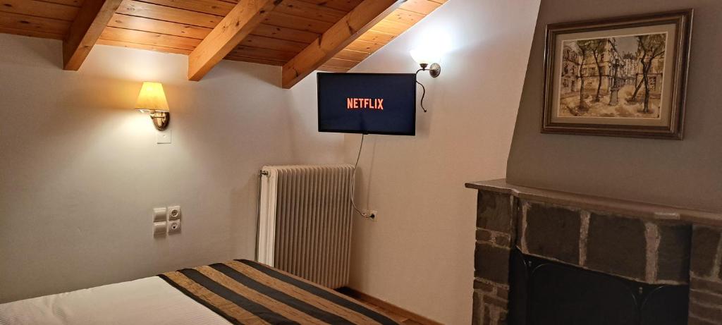 Postel nebo postele na pokoji v ubytování Archontiko Tzoumerkon