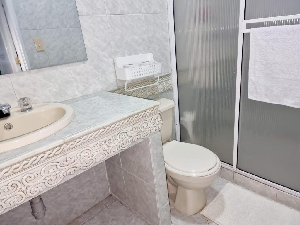Koupelna v ubytování Hermosa casa en Bucaramanga