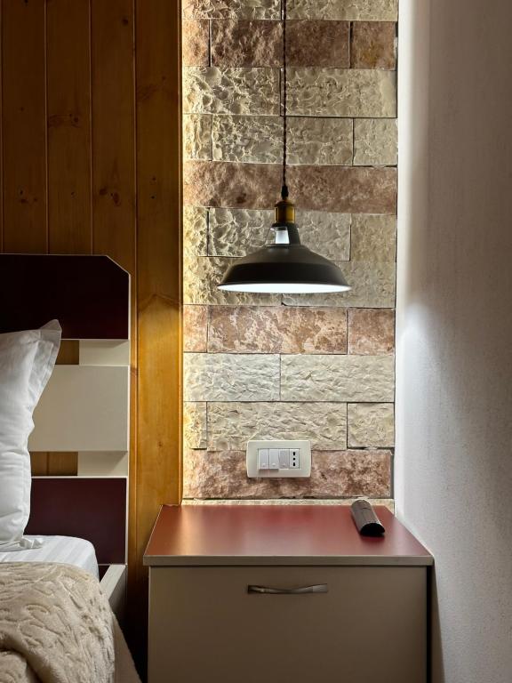 Postel nebo postele na pokoji v ubytování "Mani Guest House"