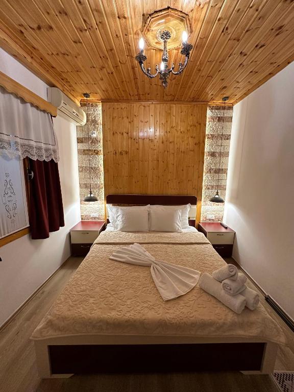 Postel nebo postele na pokoji v ubytování "Mani Guest House"