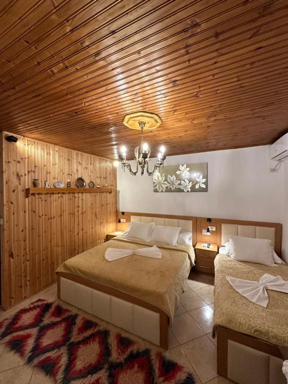 Postel nebo postele na pokoji v ubytování "Mani Guest House"