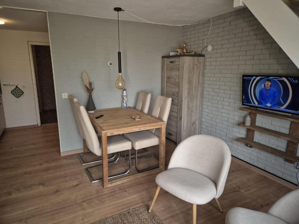 TV a/nebo společenská místnost v ubytování Appartement Bru Zeeland