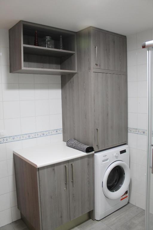 A kitchen or kitchenette at BURGOS CONTEMPLA Centro histórico. Frente al arco