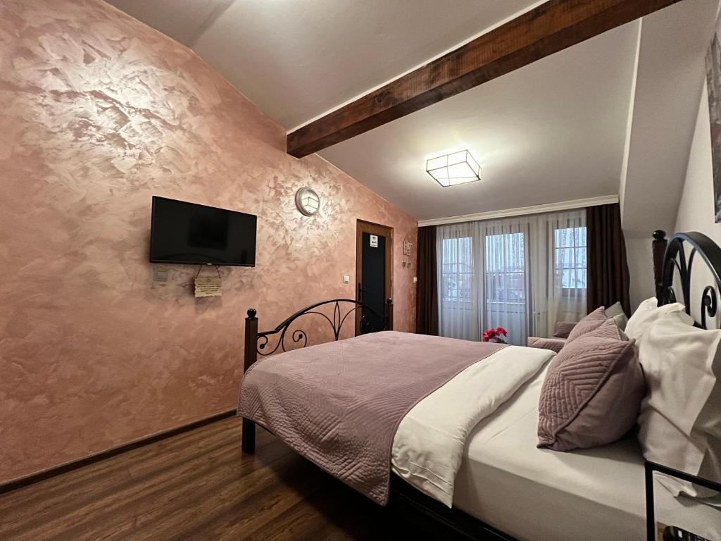 Postel nebo postele na pokoji v ubytování Hotel Fjorr