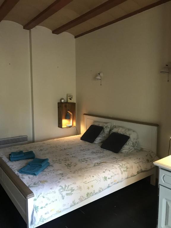 Postel nebo postele na pokoji v ubytování BelCiano (ancien Toit Vert)