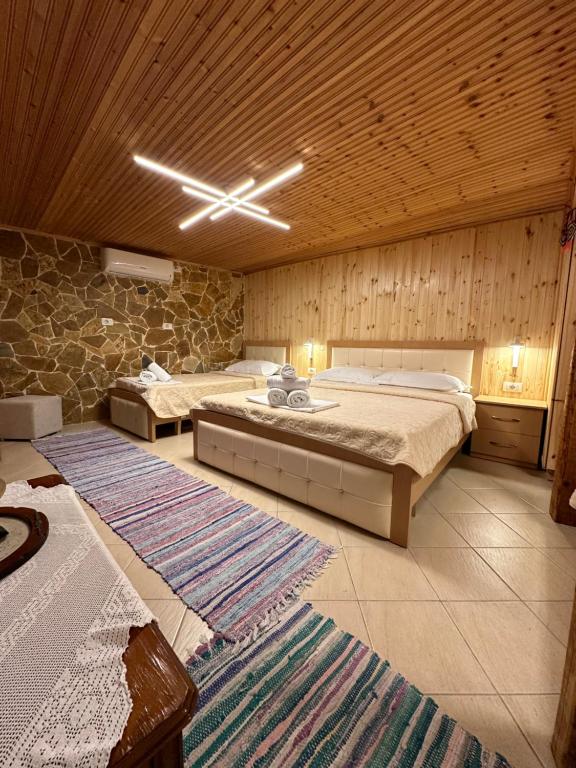Postel nebo postele na pokoji v ubytování "Mani Guest House"