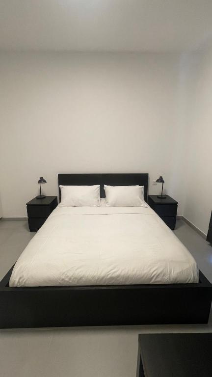 Postel nebo postele na pokoji v ubytování Al jada / Reef 4