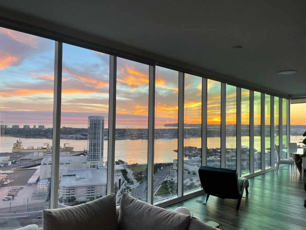 a living room with a view of a city at San Diego Convention Center Padres Ocean Views SD Zoo in San Diego