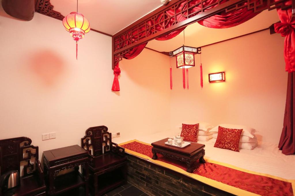 Posezení v ubytování Pingyao Ji Family Courtyard Inn